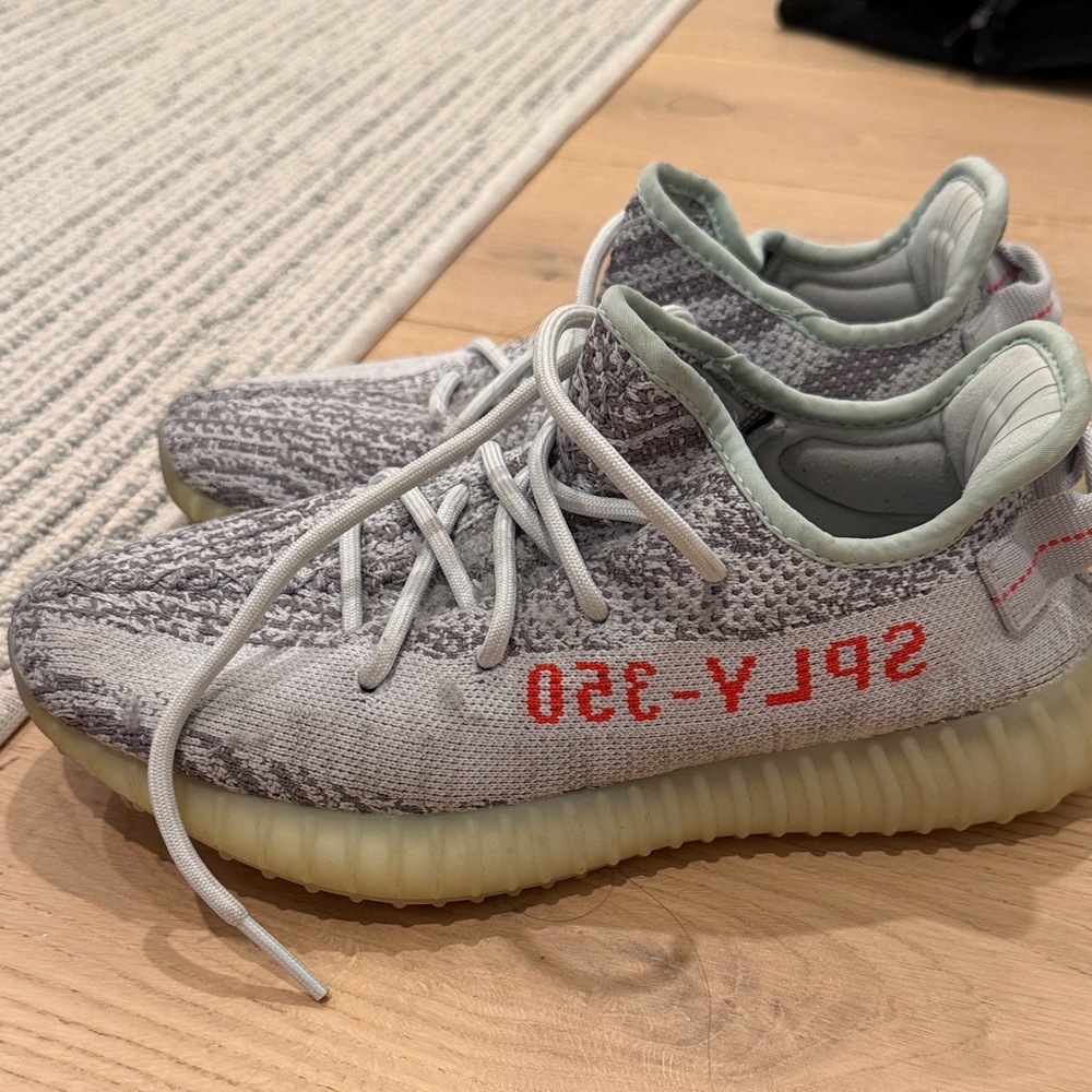 Yeezy Gray and Red Sneakers
